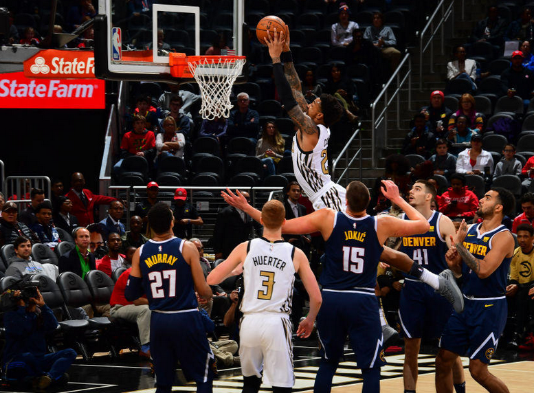  太阳加时险胜掘金登顶西部  